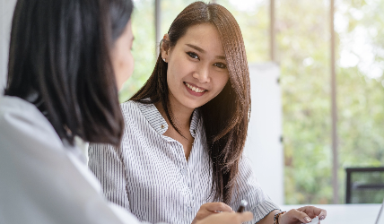 asian women stress free from personal loan